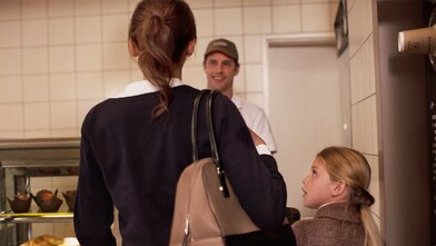 mother and daughter at counter