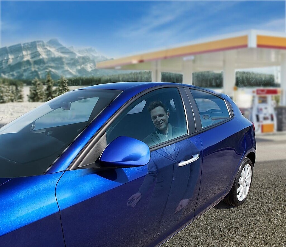 man getting directions from shell assistant