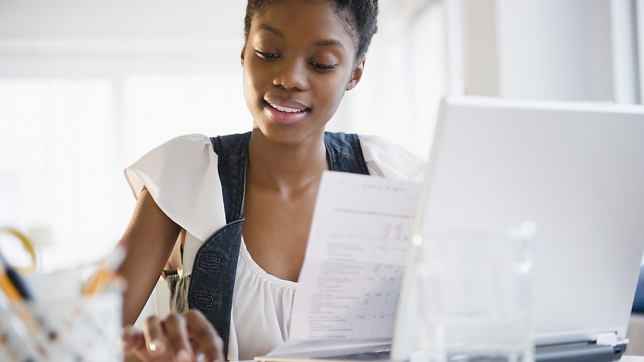 lady at desk with laptop