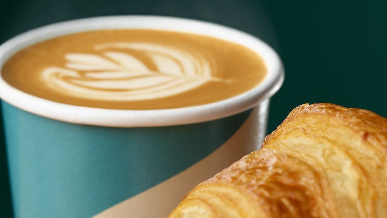 Female Barista serving a customer