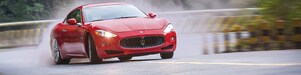 A red Maserati speeds uphill in the Shell Helix Ultra film We Know Why You Drive