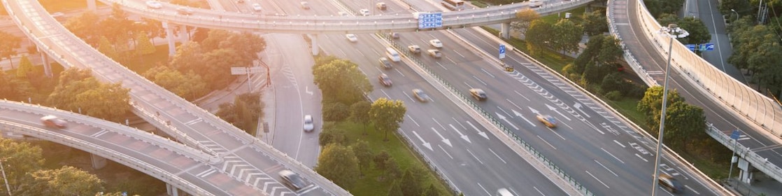 Cars driving on a complicated highway infrastructure with over and under passes